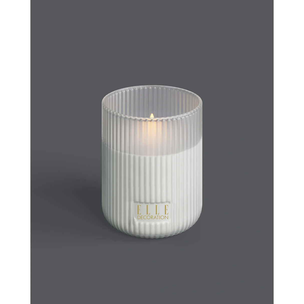 LED-Kerze – Geriffeltes Glas, Echtwachs Optik, Flackernde LED - Belleville | ELLE Decoration