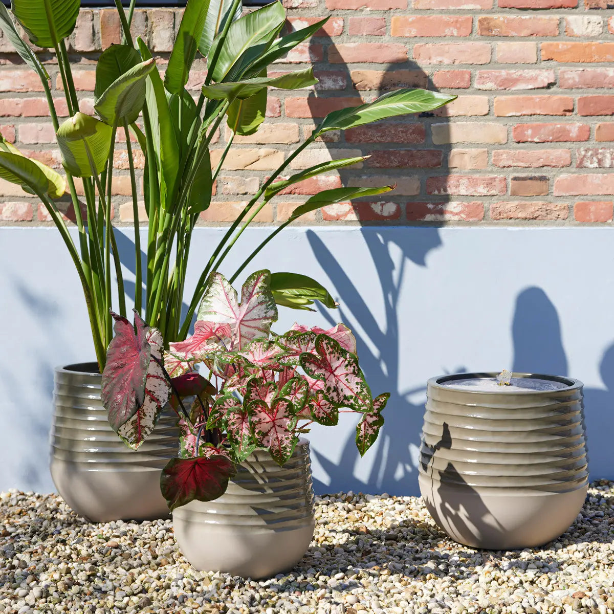 Springbrunnen – Warmes Licht, Glänzende Oberfläche, Recyceltes Material - LED Springbrunnen | Gilde