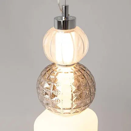 Pendant light with gold-colored metal base, transparent glass, and crystal accents in a luxurious design – Collar | Maytoni