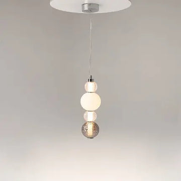 Pendant lamp with chrome metal base, transparent glass and geometric pattern in a modern design – Collar | Maytoni