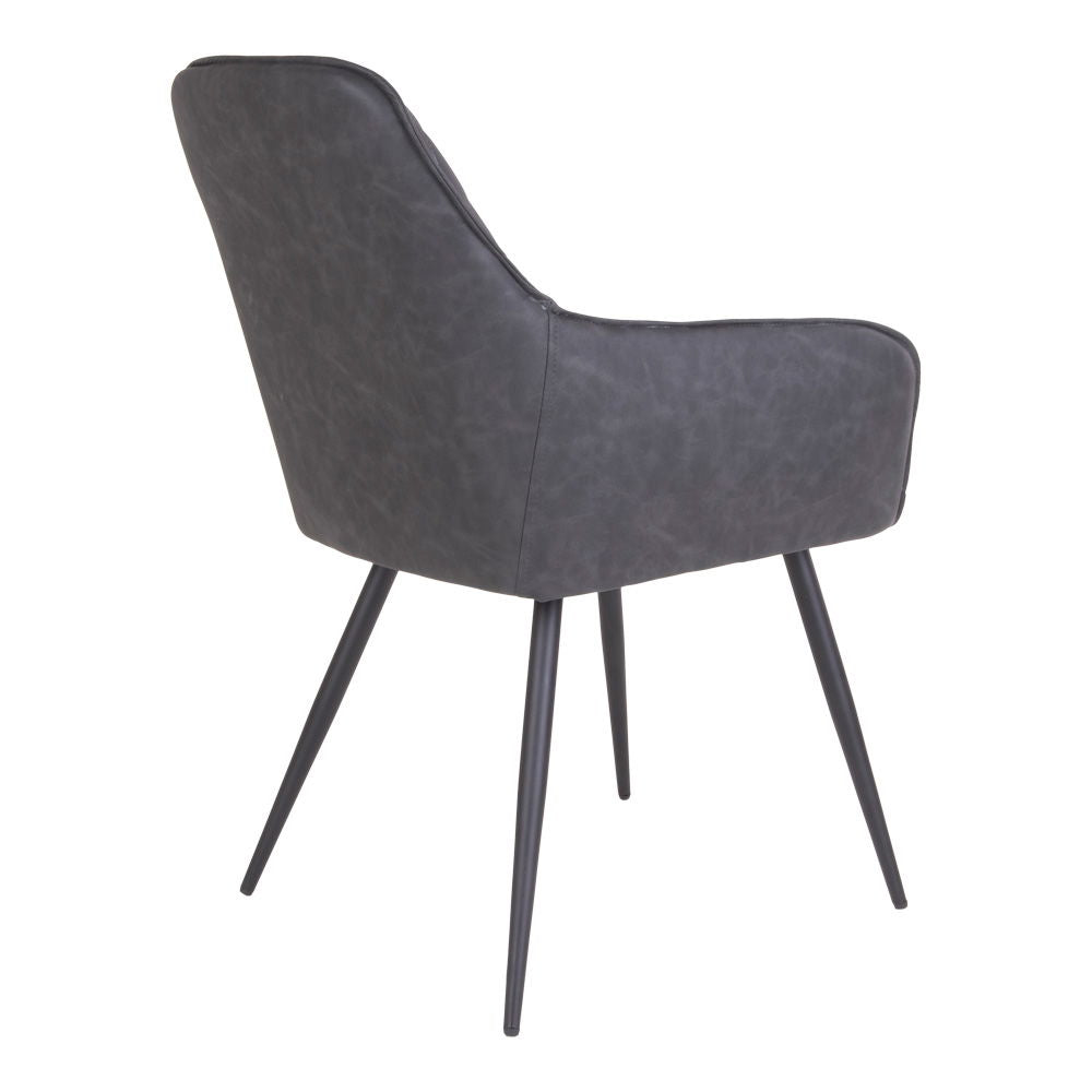 Esszimmerstuhl – Dunkelgraues PU Leder, Schwarzes Metallgestell, Ergonomische Sitzform - Harbo | House Nordic
