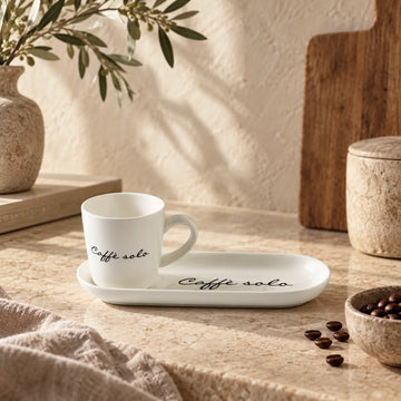 Tassen- und Untertassen-Set aus Porzellan mit Text, 85 ml, 1 Stück – Caffè Solo 2-teilig | Rivièra Maison