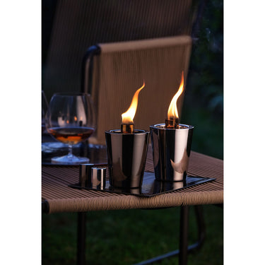 Table torch with polished silver finish and long-burning oil reservoir – Tarcia| Philippi