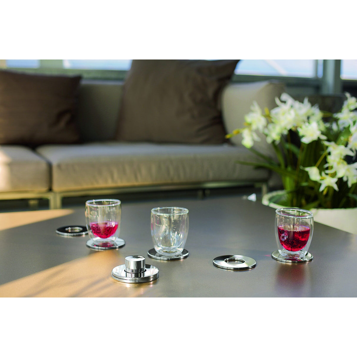 Untersetzer-Set aus metallischem Nickel spiegelpoliertes Finish weiche Anti-Rutsch-Unterseite – Rings | Philippi