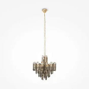 Pendant light with a gold metal frame and architectural crystal cut in a modern design - Flare | Maytoni