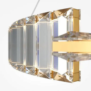 Pendant light with gold-colored metal base and asymmetrical crystal decoration in a luxurious design – Krone | Maytoni