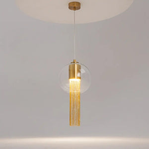 Pendant light with transparent glass shade and decorative bronze chains in an elegant design – Flusso | Maytoni