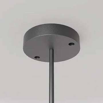 Pendant lamp with a black base and a white plastic sphere in a modern design – Erda | Maytoni