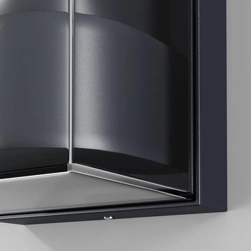 Wall lamp with graphite-colored aluminum housing and clear plastic diffuser – Conf | Maytoni