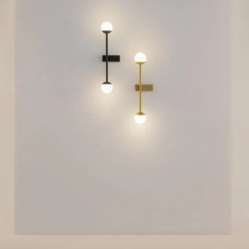 Black metal wall lamp with two white glass spheres and touch dimmer | Maytoni