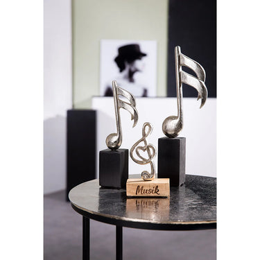 Skulptur – Musikalisches Design, Silberne Optik, Mangoholzsockel | Gilde