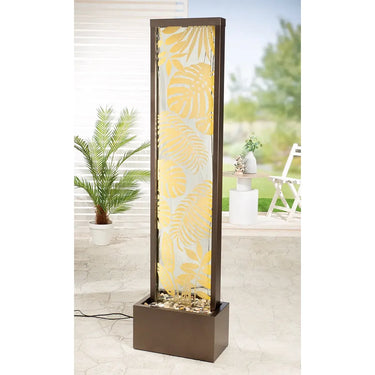 Brunnen – Beleuchtetes Spiegelglas, Schwarzes Metall, Blattmotiv | Gilde