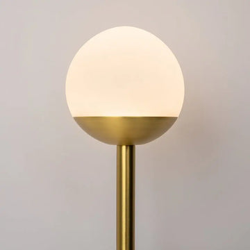 Wall light made of brass-coloured metal with two white glass spheres and touch dimmer – TOUCH | Maytoni