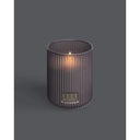 LED-Kerze – Geriffeltes Glas, Echtwachs Optik, Flackernde LED - Belleville | ELLE Decoration