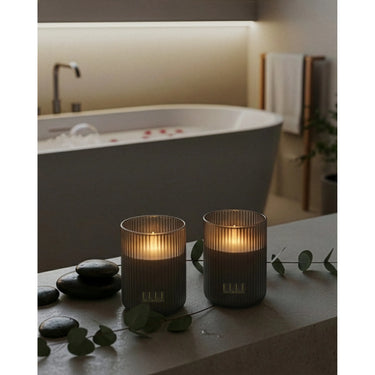 LED-Kerze – Geriffeltes Glas, Echtwachs Optik, Flackernde LED - Belleville | ELLE Decoration