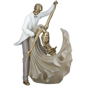 Dekofigur – Goldene Metalloptik, Tanzende Form, Weiße Akzente, Höhe 28 cm - Salsa | Gilde
