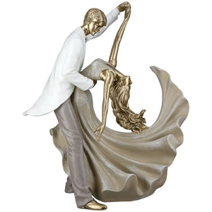 Dekofigur – Goldene Metalloptik, Tanzende Form, Weiße Akzente, Höhe 28 cm - Salsa | Gilde