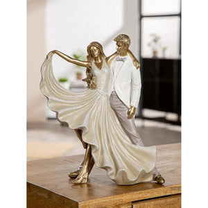 Dekofigur – Goldene Metalloptik, Tanzende Form, Weiße Akzente, Höhe 29,5 cm - Salsa | Gilde