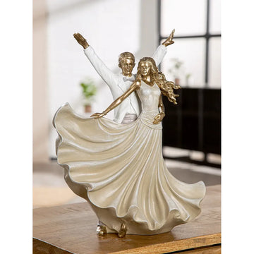 Dekofigur – Goldene Metalloptik, Tanzende Form, Weiße Akzente, Höhe 33,5 cm - Salsa | Gilde
