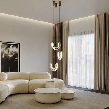 Pendant lamp with a gold-colored metal base and asymmetrical crystal decoration in a luxurious design – Maya | Maytoni
