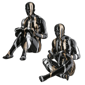 Buchstützen – Personenform, Schwarze Metalloptik, Silberne Linien, Höhe 22,5 cm - Drip | Gilde