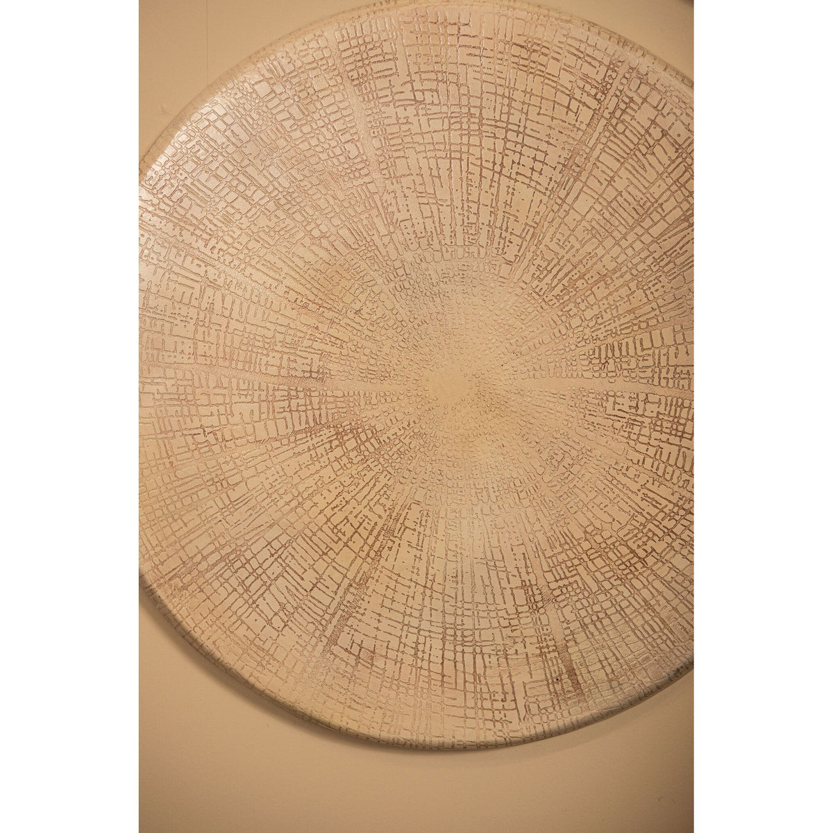 Wall panel made of aluminum sheet in beige with a textured surface, round shape, S – Raizo | PTMD