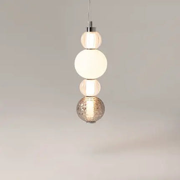 Pendant lamp with chrome metal base, transparent glass and geometric pattern in a modern design – Collar | Maytoni