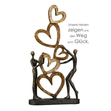 Skulptur – Strukturierte Oberfläche, Bronzene Optik, Goldenes Herz - Herz auf Herz | Gilde