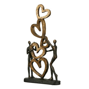 Skulptur – Strukturierte Oberfläche, Bronzene Optik, Goldenes Herz - Herz auf Herz | Gilde