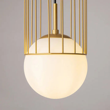 Pendant light with gold-colored metal base and white glass diffuser in a modern design – Telford | Maytoni