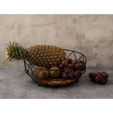 Obstschale aus filigranem Metalldraht mit Mangoholz-Boden, offene Drahtstruktur, luftiges Design – Neo | MVG Voglrieder