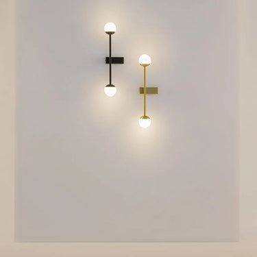 Wall light made of brass-coloured metal with two white glass spheres and touch dimmer – TOUCH | Maytoni