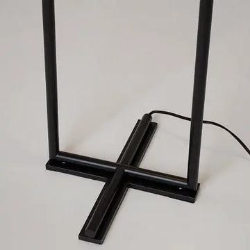 Floor lamp made of metal & glass spheres with ergonomic cross base – The Sixth Sense | Maytoni