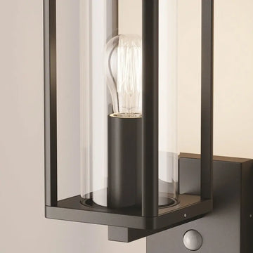 Wall lamp with graphite-colored metal housing, clear acrylic diffuser and motion sensor – Cell | Maytoni