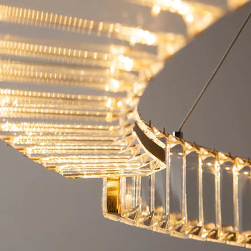 Pendant lamp with brass finish and asymmetrical crystal decoration in a luxurious design – Krone | Maytoni