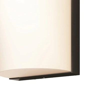 Wall light with a graphite-colored aluminum housing and a rounded, matte white diffuser – Badd | Maytoni