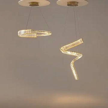 Pendant lamp with brass finish and asymmetrical crystal decoration in a luxurious design – Krone | Maytoni