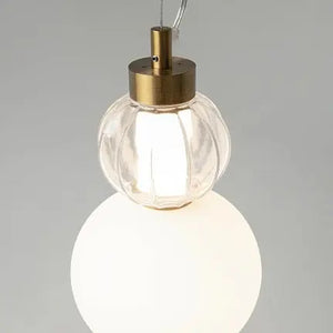 Pendant light with a gold-colored metal base and geometrically structured glass in a modern design – Collar | Maytoni
