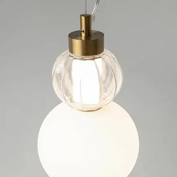 Pendant light with a gold-colored metal base and geometrically structured glass in a modern design – Collar | Maytoni