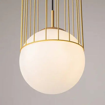 Pendant light with gold-colored metal base and white glass diffuser in a modern design – Telford | Maytoni