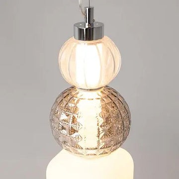 Pendant light with gold-colored metal base, transparent glass, and crystal accents in a luxurious design – Collar | Maytoni