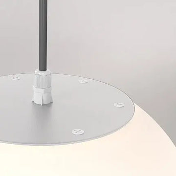 Pendant lamp with a black base and a white plastic sphere in a modern design – Erda | Maytoni