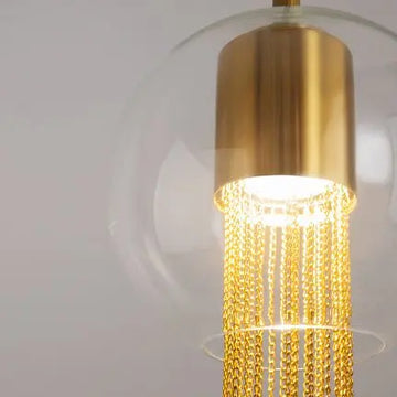 Pendant Lamp with Bronze Finish and Decorative Glass Chains in an Elegant Design – Flusso | Maytoni