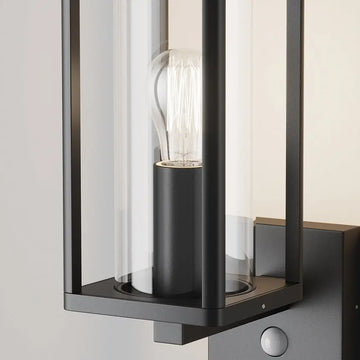 Wall lamp with graphite-colored metal housing, clear acrylic diffuser and motion sensor – Cell | Maytoni