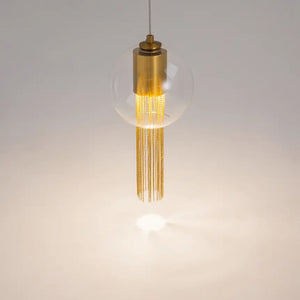 Pendant light with transparent glass shade and decorative bronze chains in an elegant design – Flusso | Maytoni