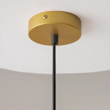 Pendant light with gold-colored metal base and white glass diffuser in a modern design – Telford | Maytoni