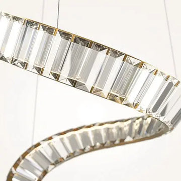 Pendant lamp with brass finish and asymmetrical crystal decoration in a luxurious design – Krone | Maytoni