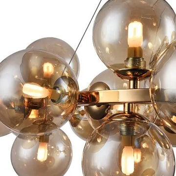 Pendant lamp with a gold-colored metal frame and amber, mirrored glass diffusers in a modern design - Dallas | Maytoni