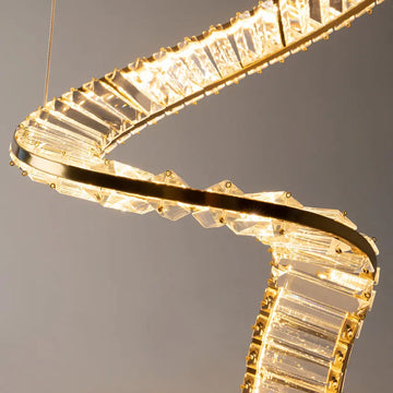 Pendant lamp with brass finish and asymmetrical crystal decoration in a luxurious design – Krone | Maytoni