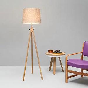 Floor lamp made of metal & wood frame with fabric shade in tripod design – Calvin | Maytoni